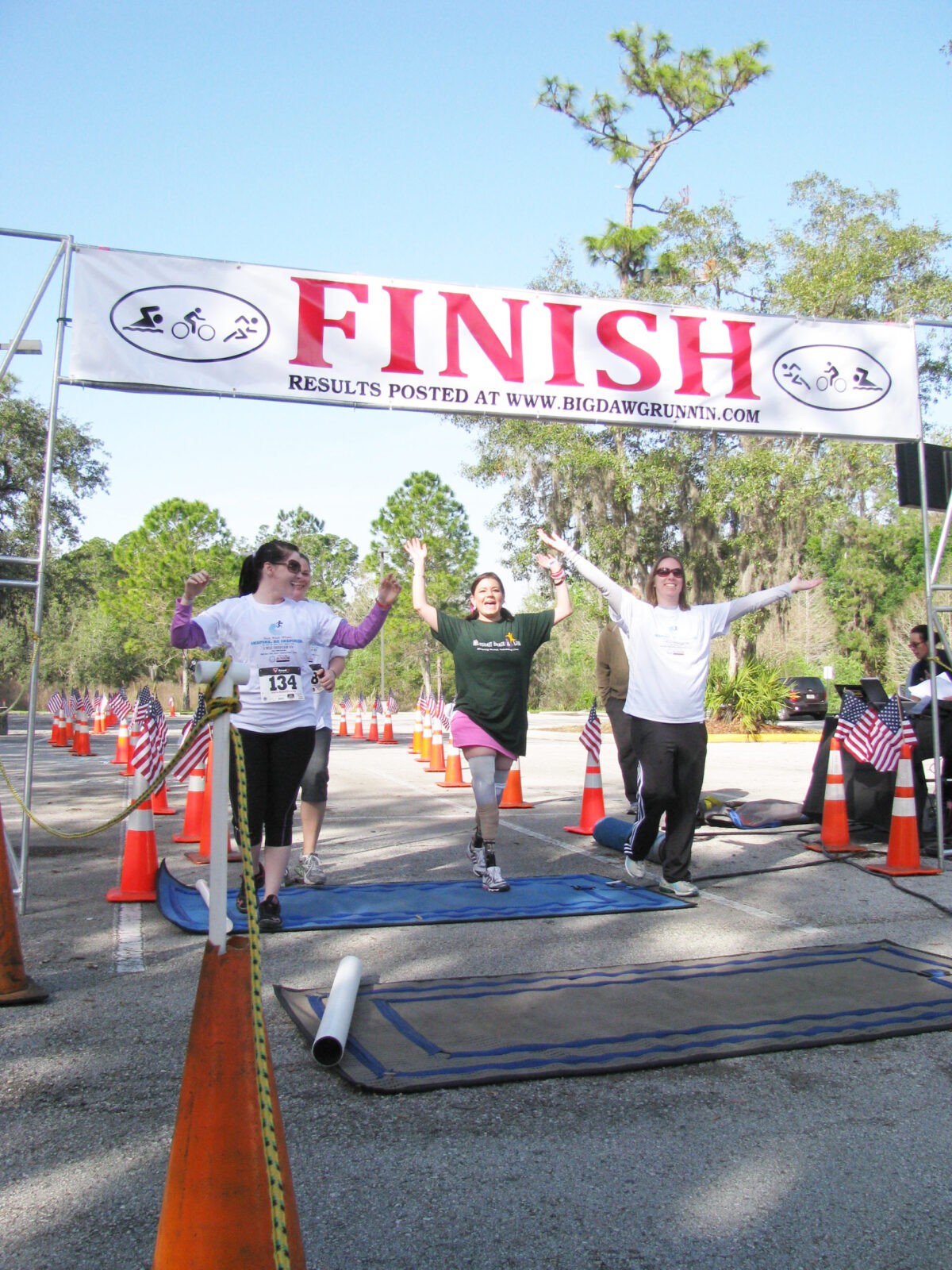 IMG_0008 amputee crossing finish line in race
