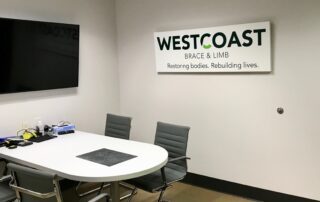 Patient room with new logo sign at WCBL Fletcher office