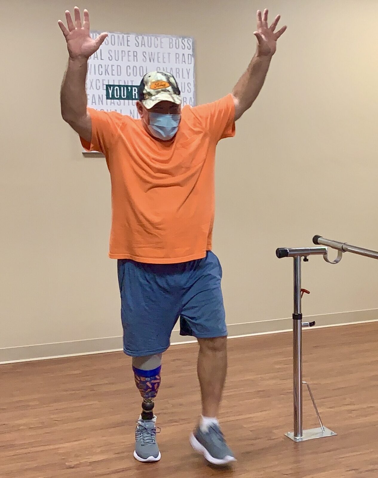 Man with below knee amputation wearing prosthetic leg