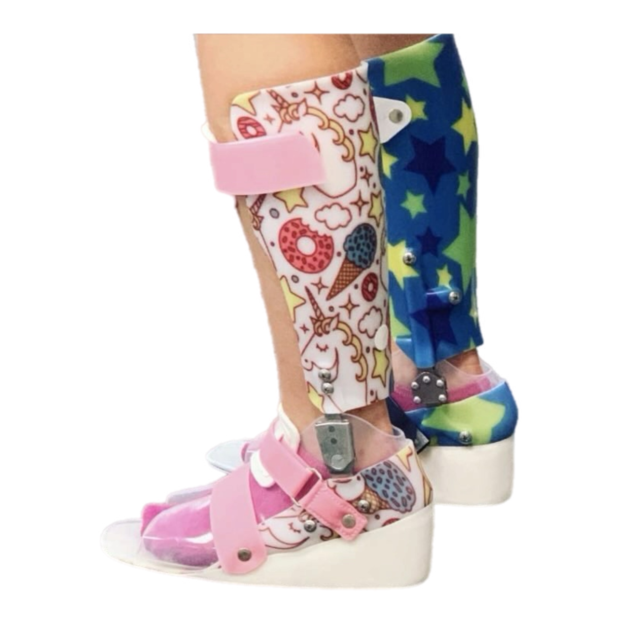two wedged AFO's on person's feet, standing, one pink donuts and one green and blue pattern.